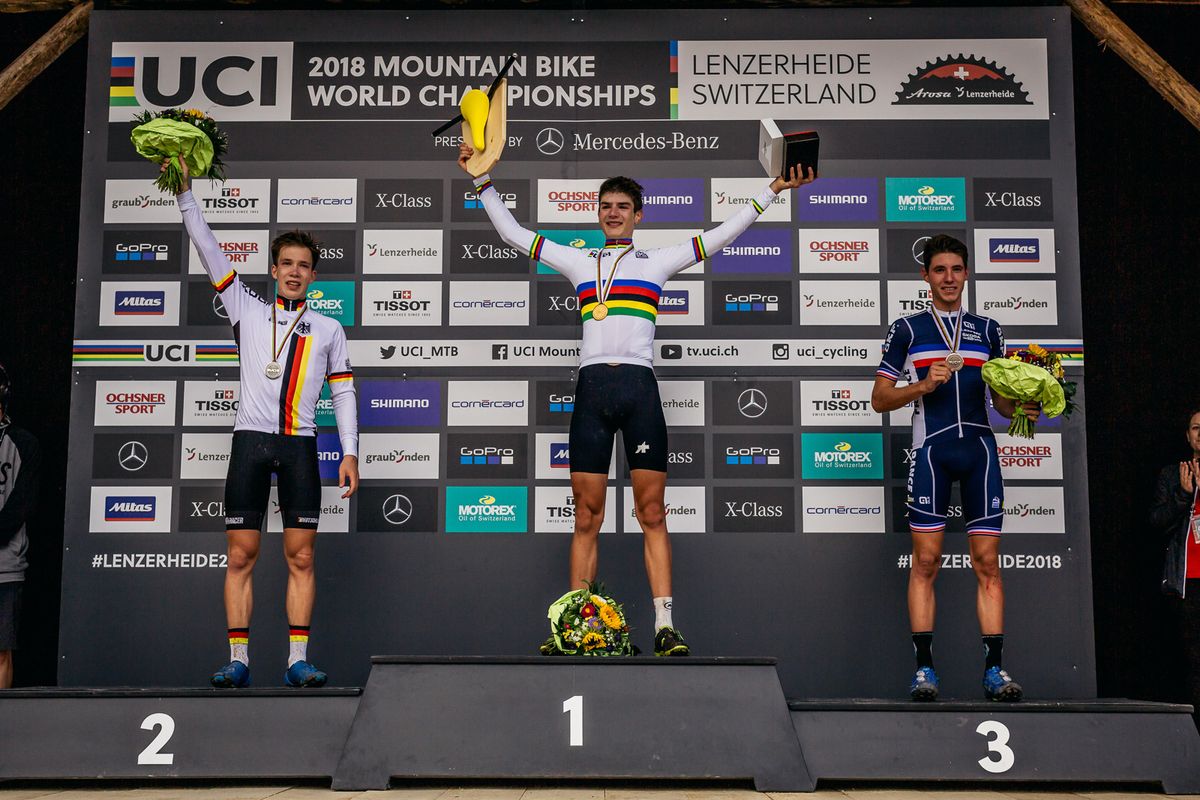 The junior men's podium