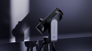 Unistellar Odyssey smart telescope with futuristic grey background
