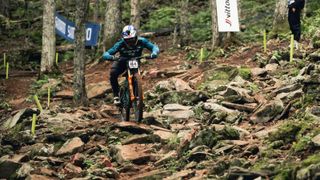 A mountain biker in a very challenging rock section