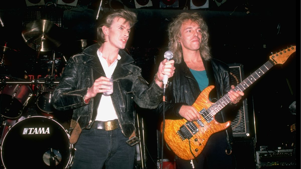 Peter Frampton and David Bowie performing on stage together