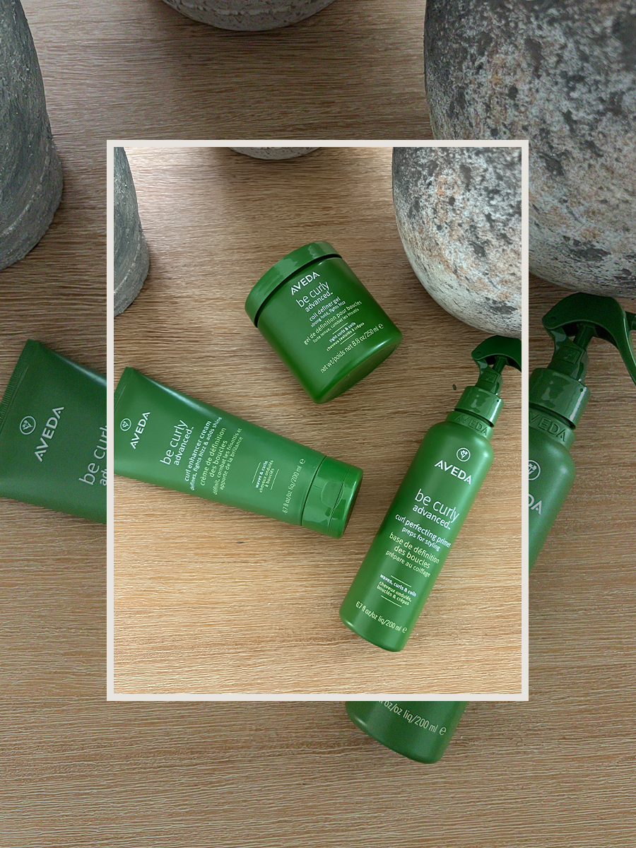 aveda be curly products flatlay