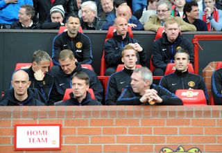Paul Scholes, back right, was part of manchester United caretaker manager Ryan Giggs' coaching staff in 2014