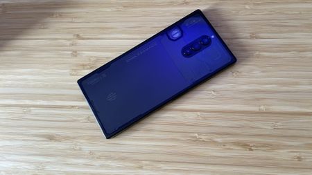 RedMagic 8S Pro gaming phone on a wooden desk