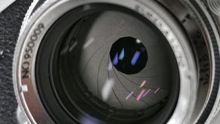 Thypoch Eureka 50mm f/2 lens iris blades close up