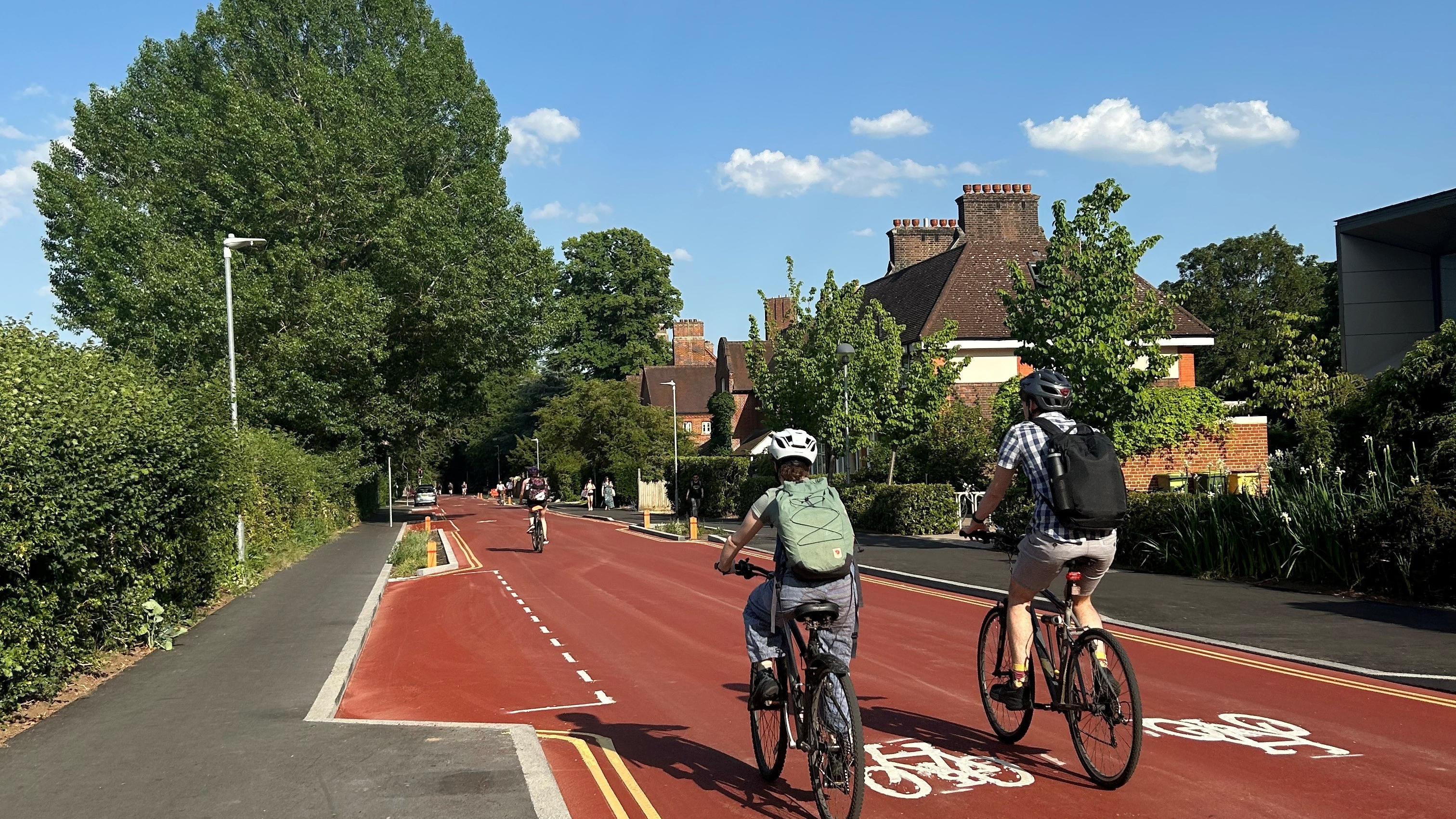 Cyclists riding along Adams Road, Cambridge 
