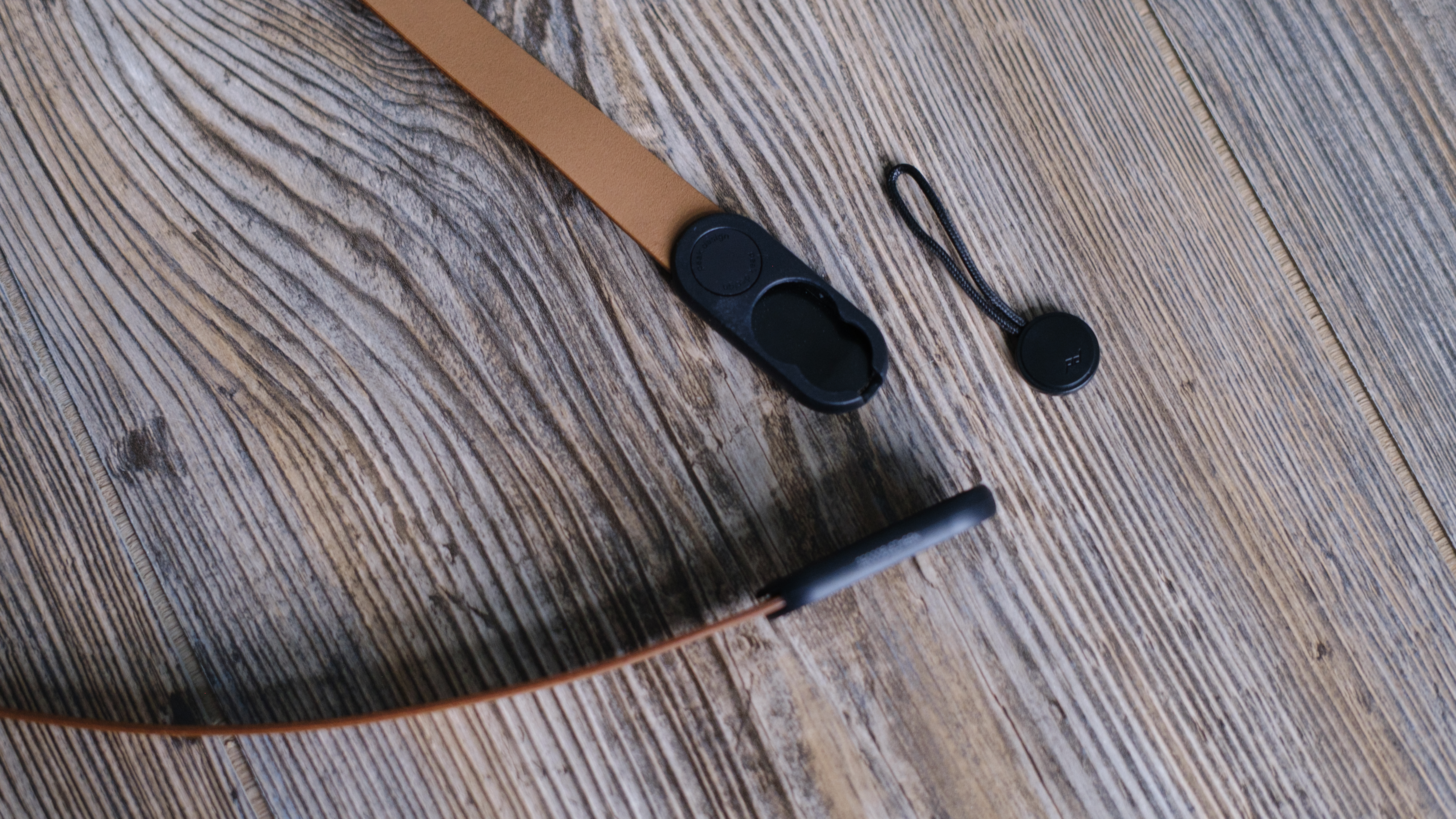 The Peak Design Form leather camera strap in the Amber color