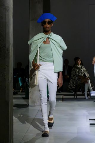 a Marni model walks the spring/summer 2025 runway in skinny pants