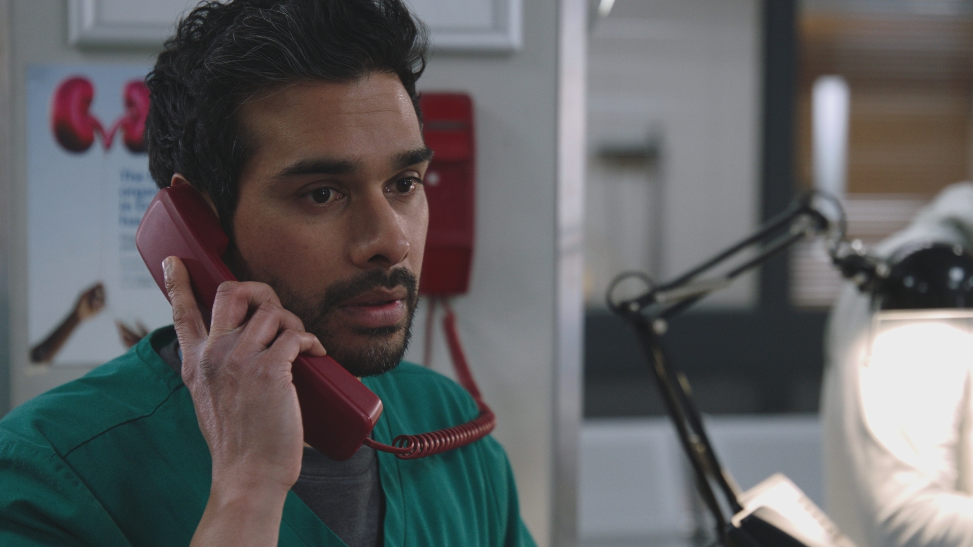 EMBARGO 9/9/25 Rash Masum answers Holby ED&#039;s emergency red phone and hears Sunny has been seriously injured.