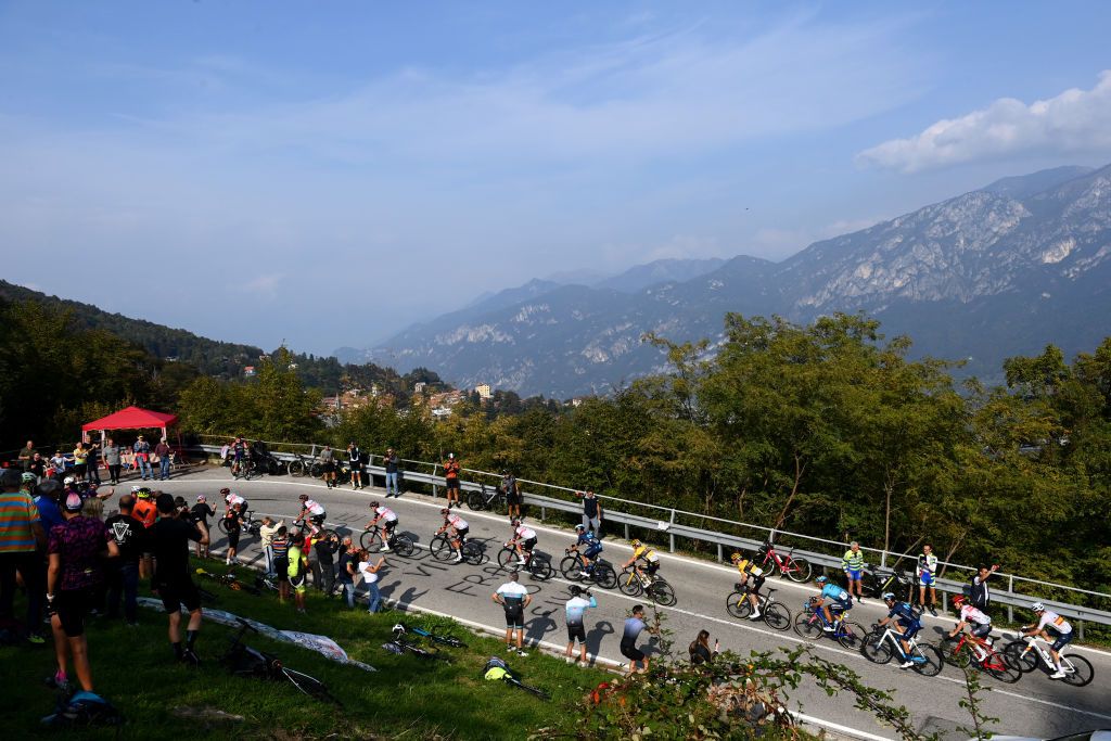 COMO ITALY OCTOBER 08 A general view of the Peloton compete climbing to the Madonna del Ghisallo 758m during the 116th Il Lombardia 2022 a 253km one day race from Bergamo to Como iLombardia on October 08 2022 in Como Italy Photo by Tim de WaeleGetty Images
