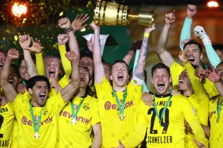 Borussia Dortmund players celebrate after winning the DFB Pokal in 2021.