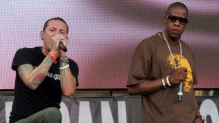Chester Bennington of Linkin Park onstage with Jay-Z