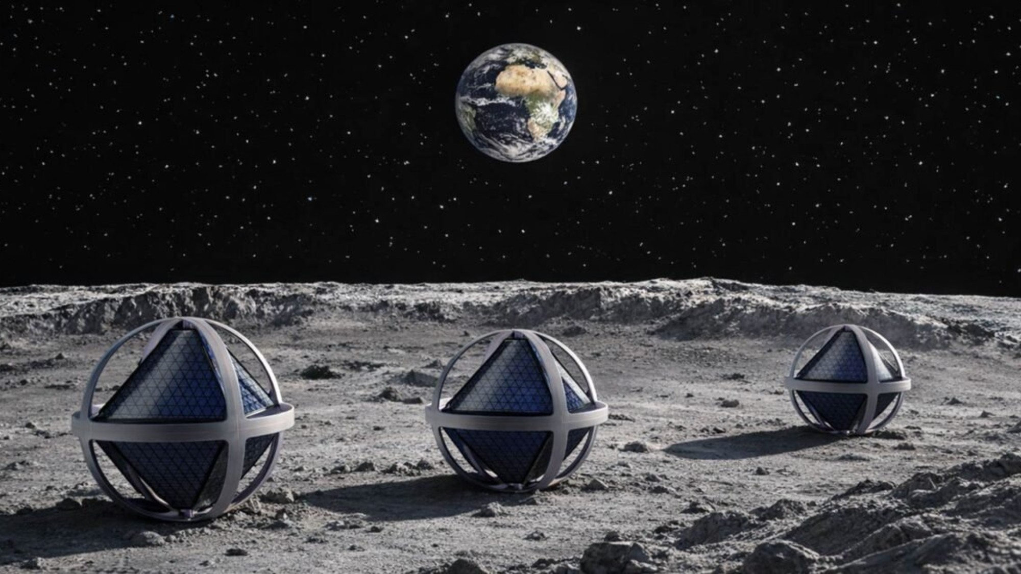 three spherical objects consisting of spherical metal frames enclosing tetrahedral solar panels sit on a dusty grey surface, with earth visible in a starry black sky in the distance