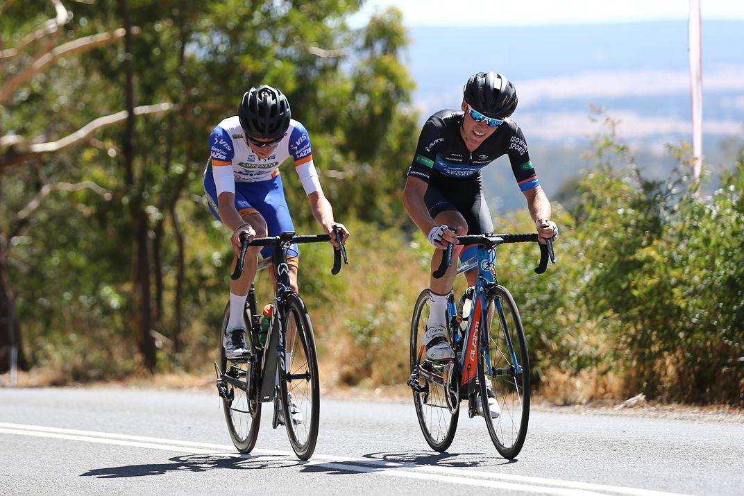 Chris Hamilton with Lucas Hamilton on the climb