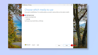 A screenshot of the Windows 10 media creation tool, with red arrows pointing at Use flash drive, and Next. 