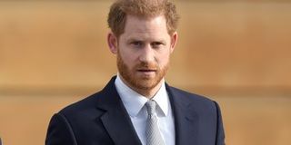 Prince Harry in a suit.