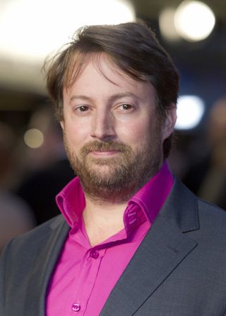 British actor David Mitchell arrives at at a cinema in west London, for the UK Premiere of 'The Debt,