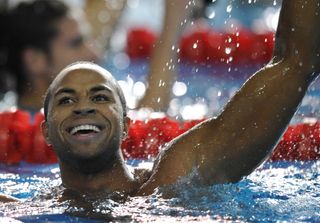 Brett Fraser from Cayman Islands celebrates after winning the final of the mens 200metre freestyle swimming event during the 2011 Pan American games in Guadalajara Mexico on October 18 2011 AFP PHOTO FRANCOIS XAVIER MARIT Photo credit should read FRANCOIS XAVIER MARITAFP via Getty Images