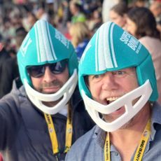 Mike Tindall and friend wearing blue helmets at the Super Bowl