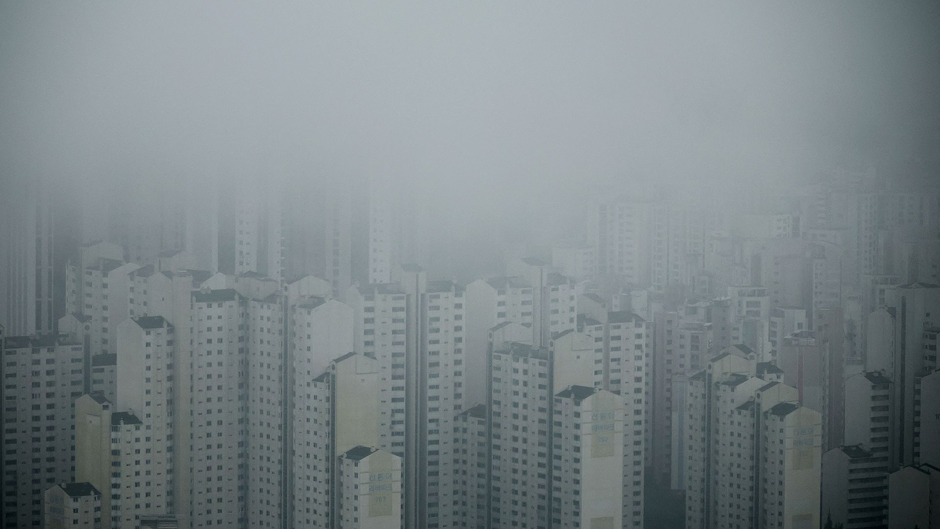 
                                Apartment complexes are shrouded in rain clouds in Seoul, South Korea
                            