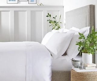 Essential Egyptian Cotton Bed Linen Collection on a bed.