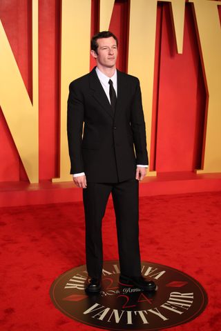 Callum Turner on the red carpet at the Vanity Fair 2024 Oscar Party