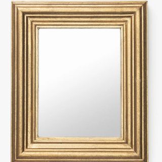 A gold mirror from McGee & Co.