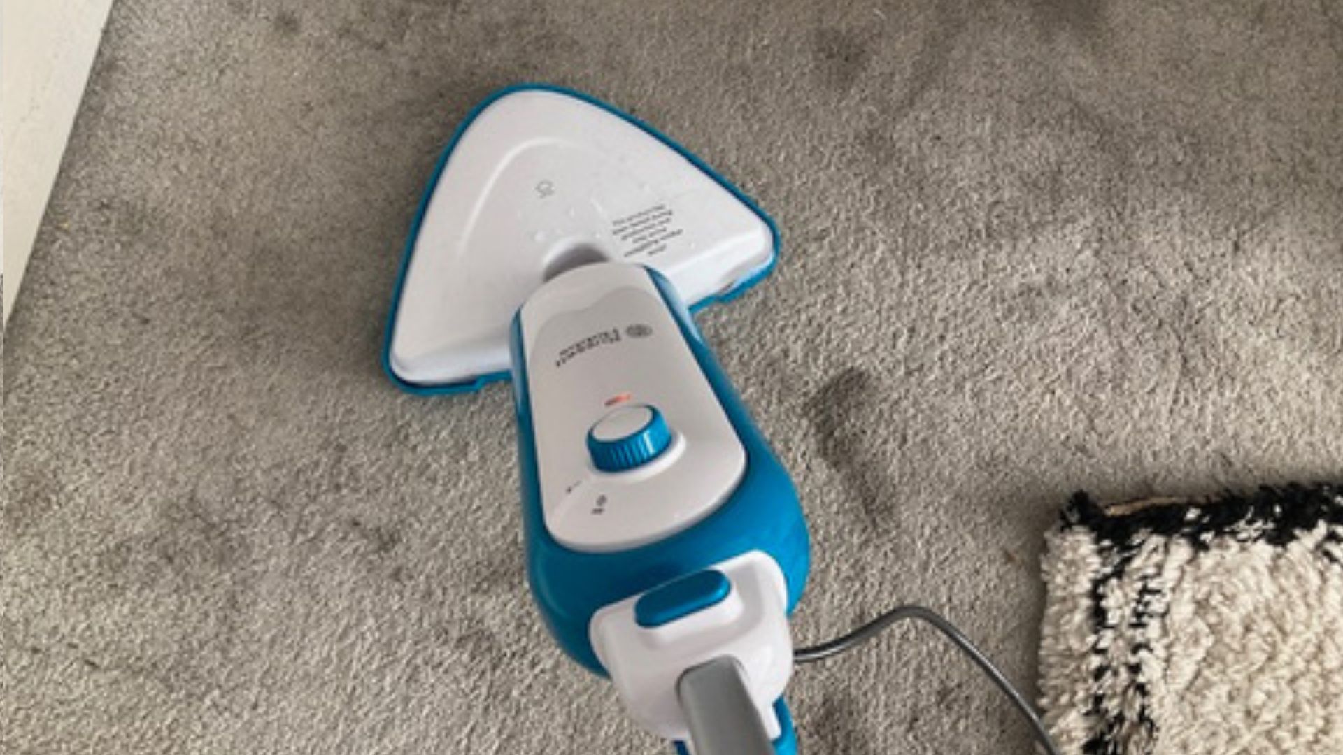 Testing the Russell Hobbs Steam and Clean Lightweight Steam Mop in Linda's home