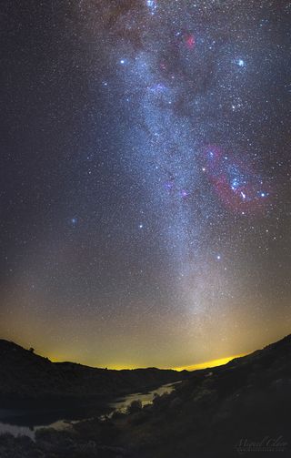 A vertical panorama captured in Pulo do Lobo, Dark Sky® Alqueva Mértola, Portugal, shows a winter Milky Way full of deep-sky objects and the Zodiacal Light.