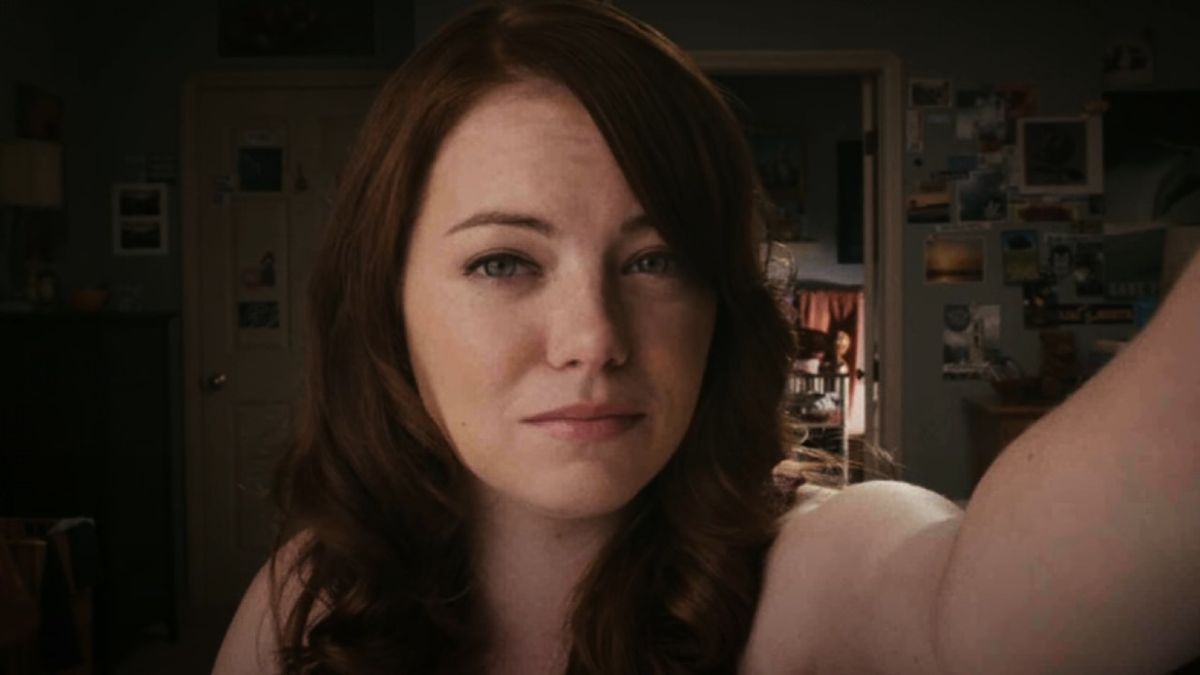 Emma Stone looking into a webcam in Easy A.