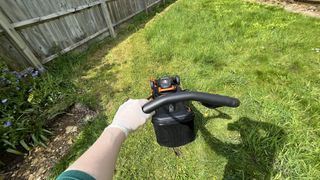 WORX WG743E Cordless Lawnmower being tested in writers yard
