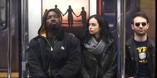 Luke, Jessica, and Matt riding the subway