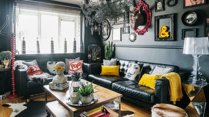 DIY Makeover Living room with dark paint, sofa and chandelier