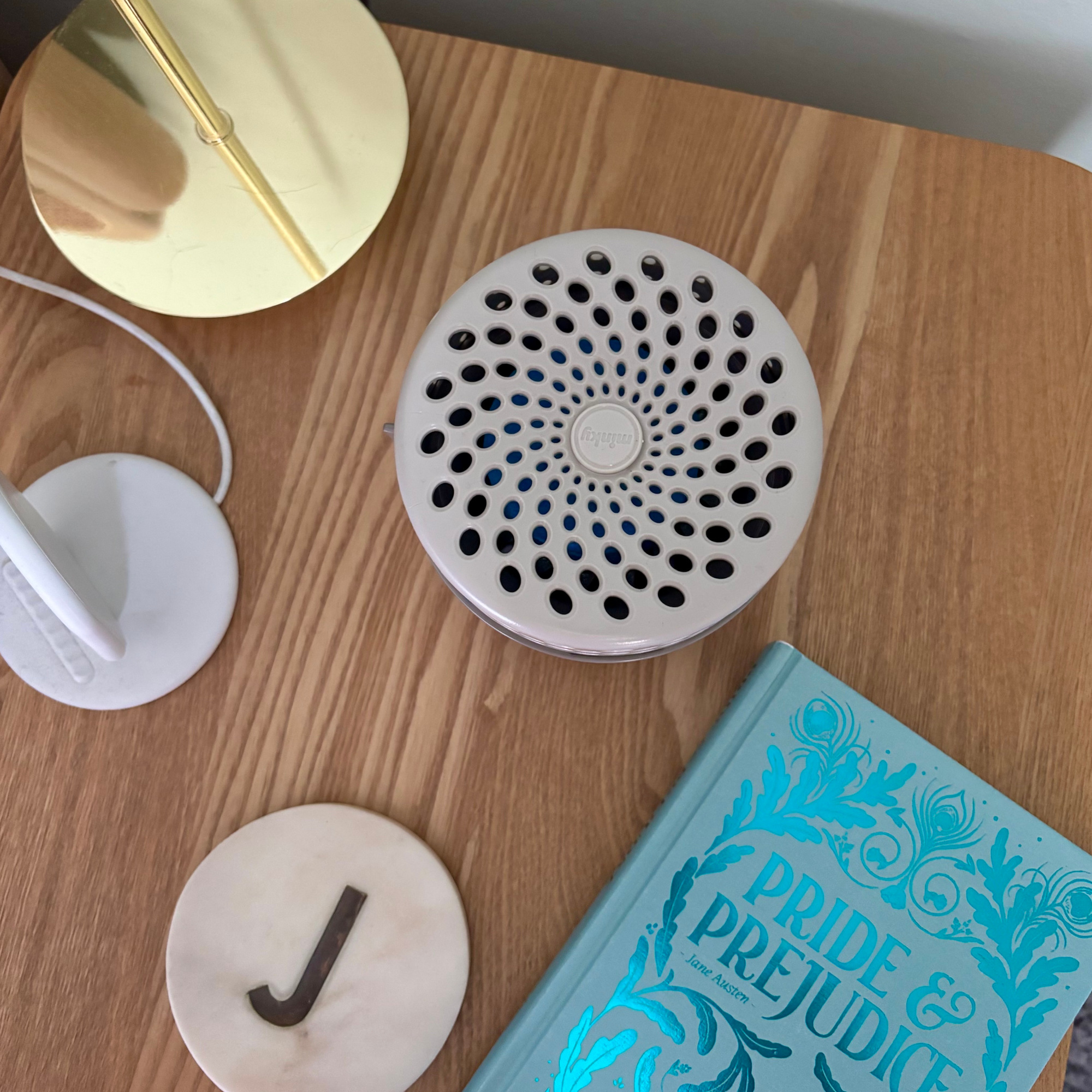 minky damp guard moisture absorber on a bedside table