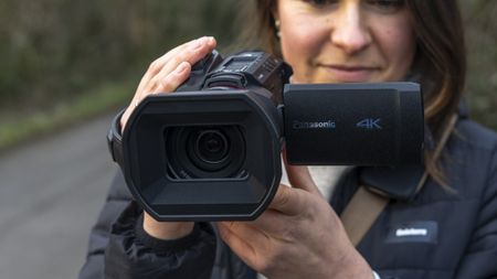 The Panasonic HC-X1500 camcorder in a female photographer's hands