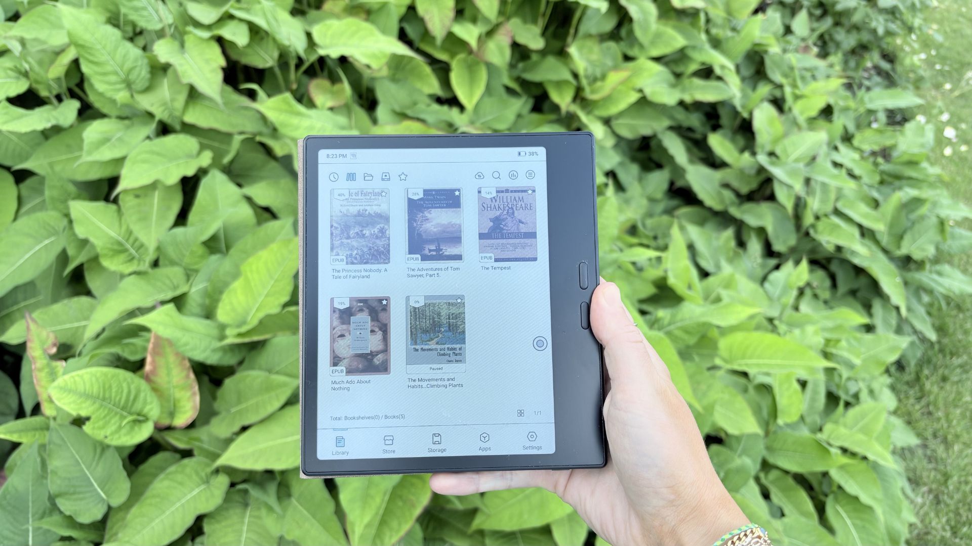 BOOX Go Colour Gen 2 eReader librray on the screen in front of a green background