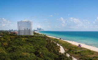 Exterior of Eighty Seven Park with view of the beach at the side