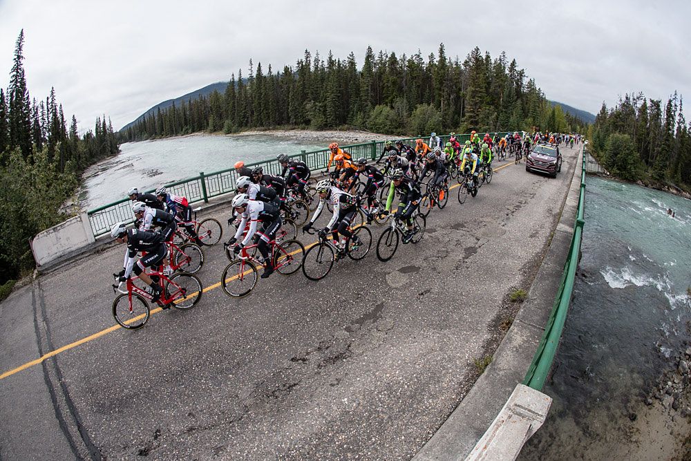 The peloton crosses a river during today's stage