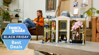 Lego Natural History museum in lifestyle setting with Tom's Guide deal badge