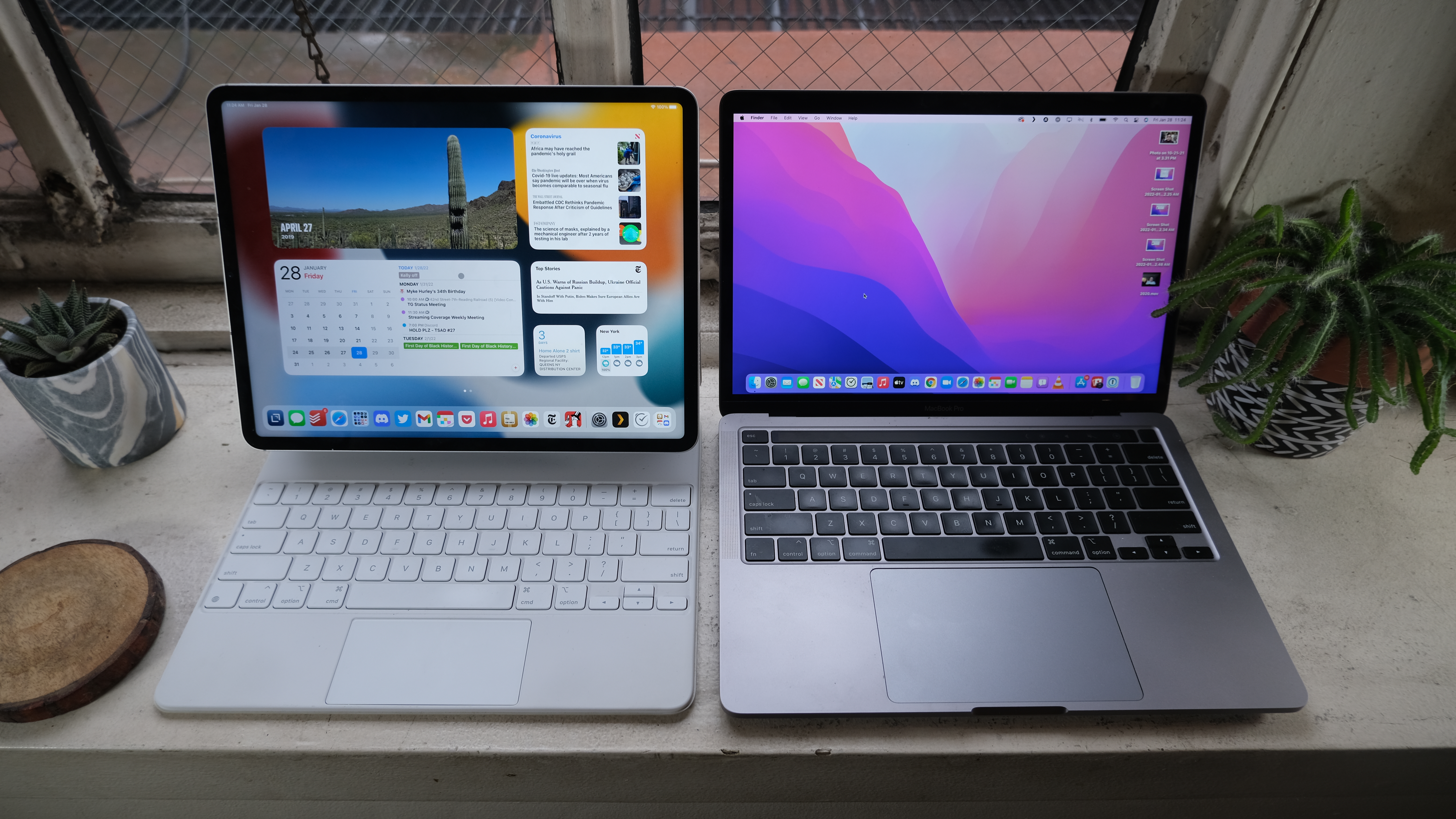 An iPad Pro and a MacBook Pro side by side
