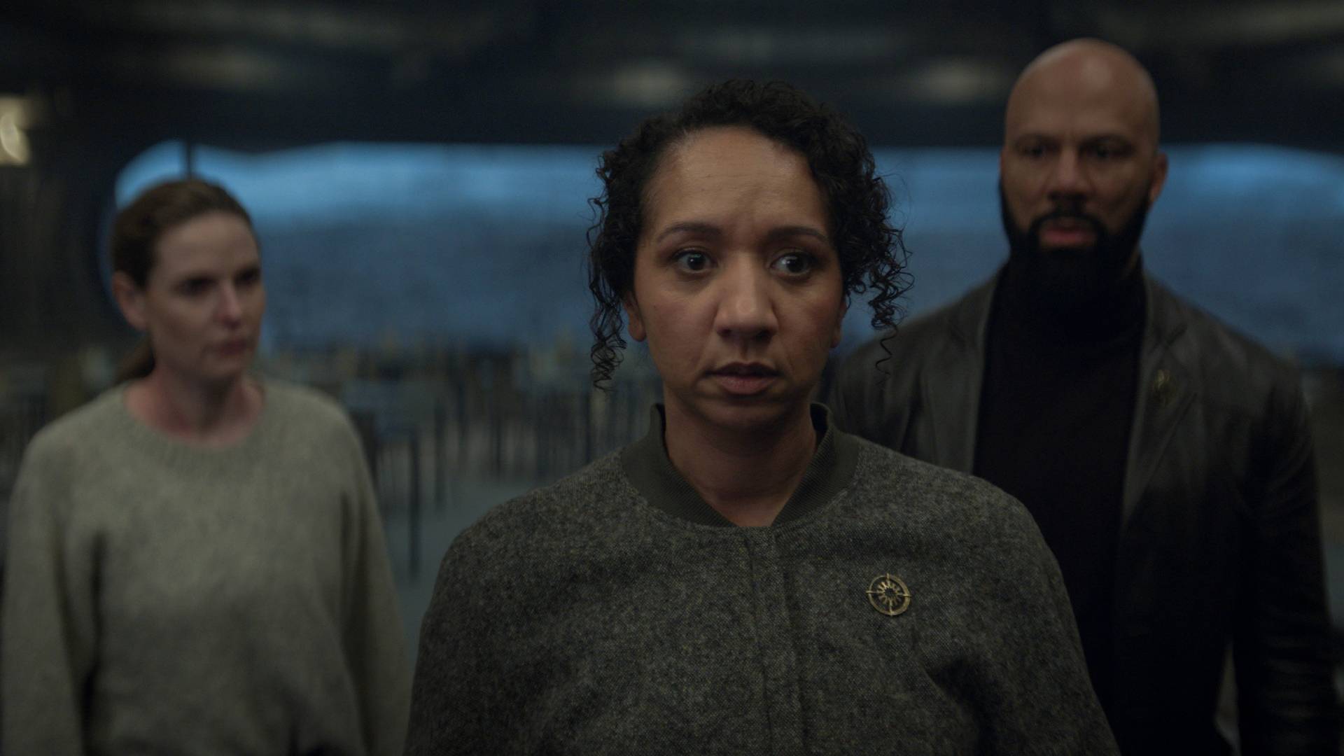 Rebecca Ferguson as Juliette Nicholson, Alexandria Riley as Camille Sims and Common as Robert Sims in Silo season 3