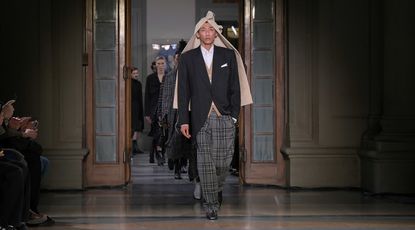 Setchu Satoshi Kuwata A/W 2025 runway show at Pitti Uomo