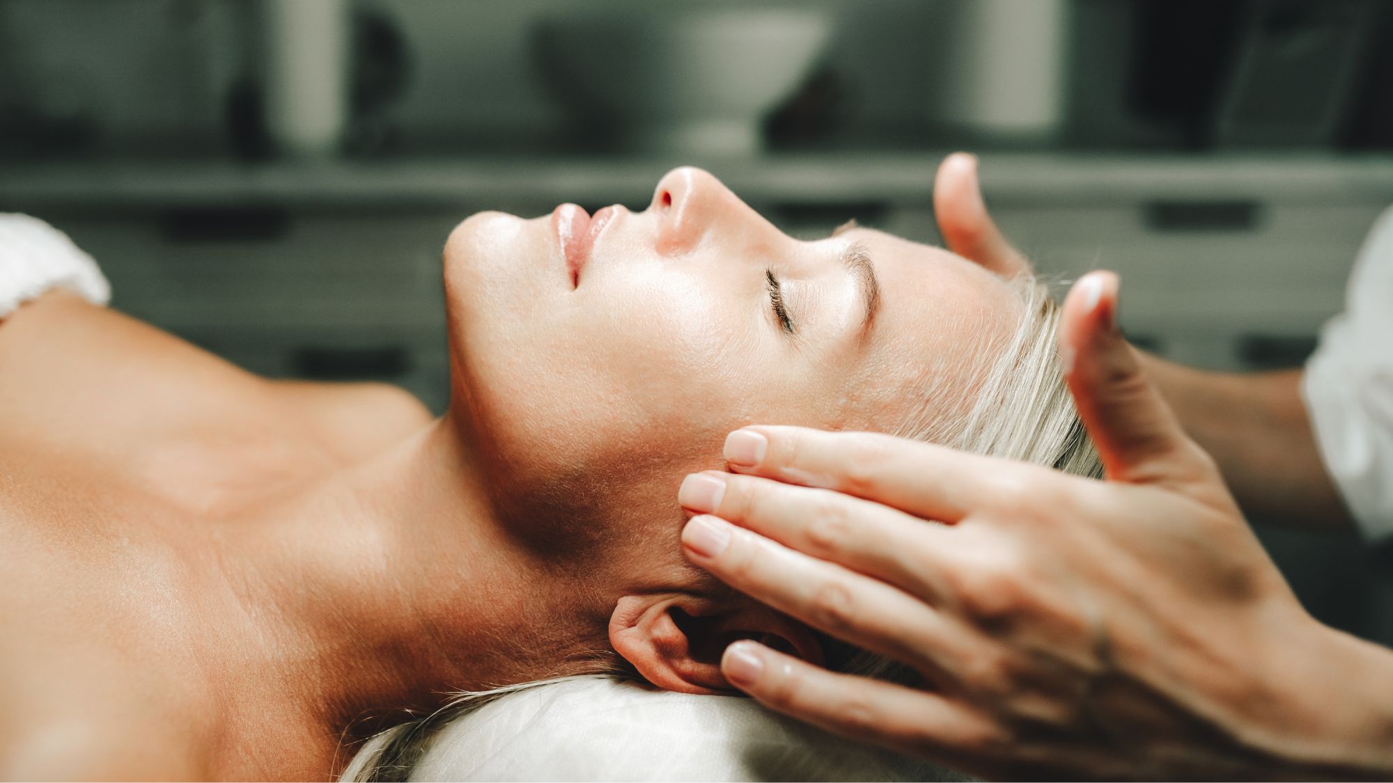 image of woman getting a facial