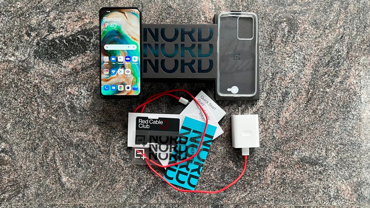 OnePlus Nord CE 2 Lite 5G box contents shows the phone, smartphone cover, documentations, fast charger and cable