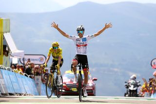 Image shows Tadej Pogačar winning stage 17 of the 2022 Tour de France