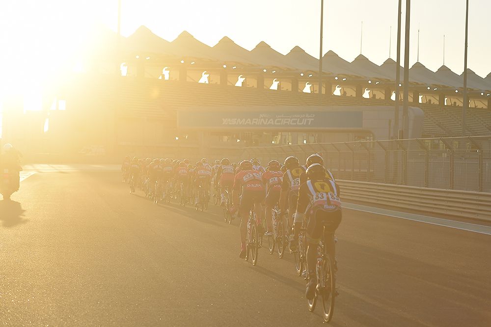 The Abu Dhabi peloton in action at the Yas Marina Formula One track.
