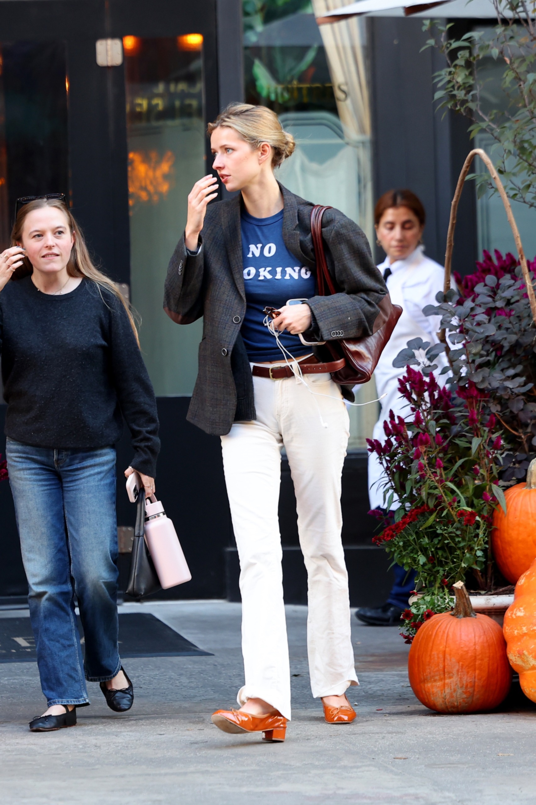 Apple Martin wears white jeans