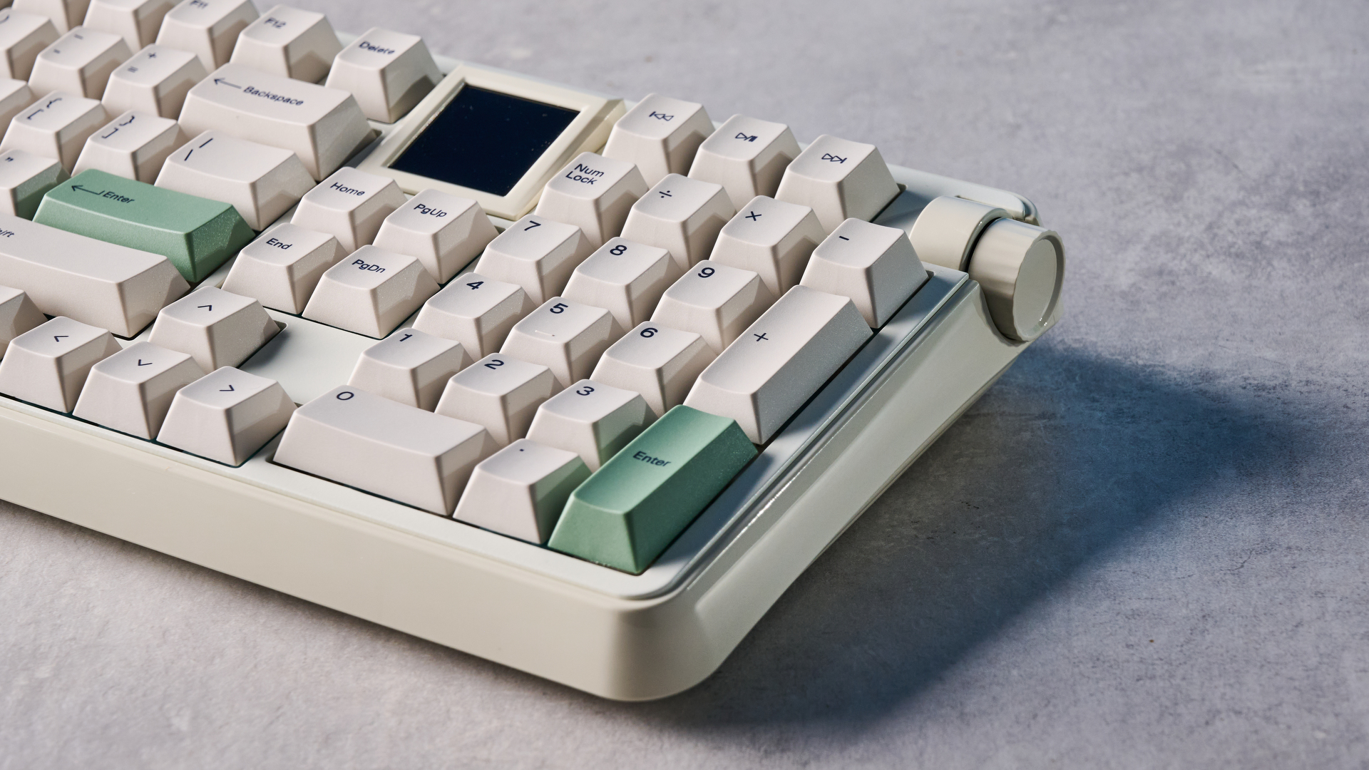 A white Epomaker RT100 Pro wireless mechanical keyboard