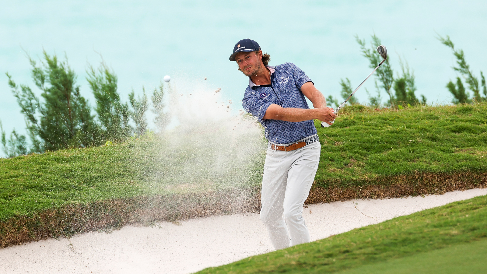 Austin Smotherman hits a bunker shot
