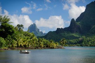 Cooks Bay with Moua Puta mountain in the background