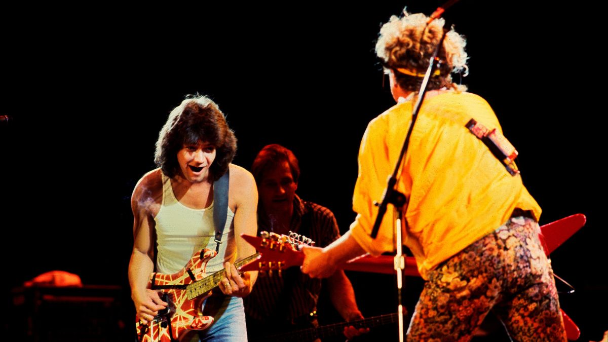 Rock musicians Eddie Van Halen and Sammy Hagar of Van Halen perform onstage at Veteran's Stadium for the first Farm Aid benefit concert, Champaign, Illinois, September 22, 1985.
